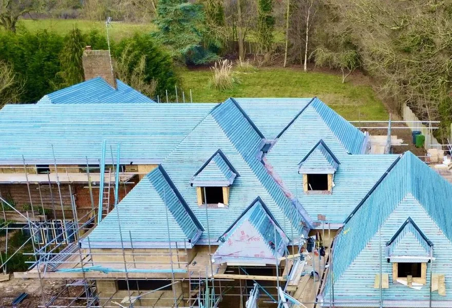 Aerial drone photo of a house roof under construction by HK Builders Ltd in Solihull and the West Midlands