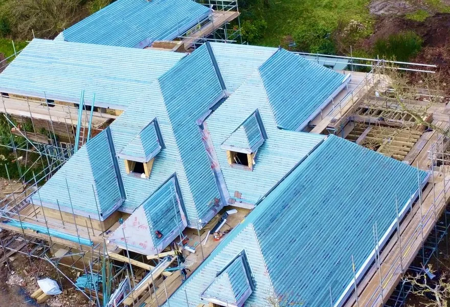 Aerial drone photo of a house roof under construction by HK Builders Ltd in Solihull and the West Midlands