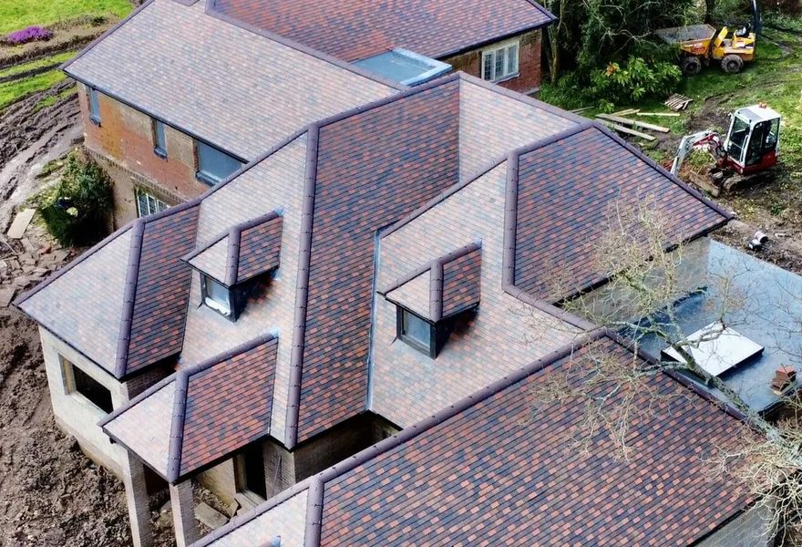 Aerial drone photo of a house roof under construction by HK Builders Ltd in Solihull and the West Midlands